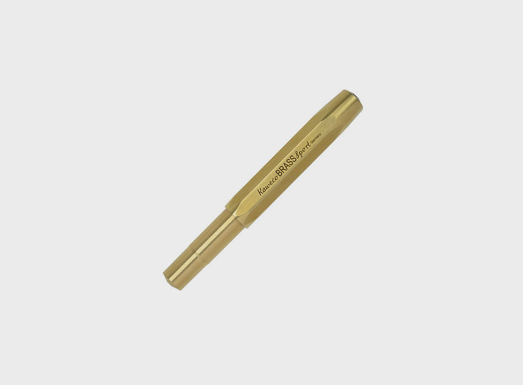 kaweko brass luxury rollerball pen, with engraved branding. Versatile and contemporary modern classic, refillable stationery 
