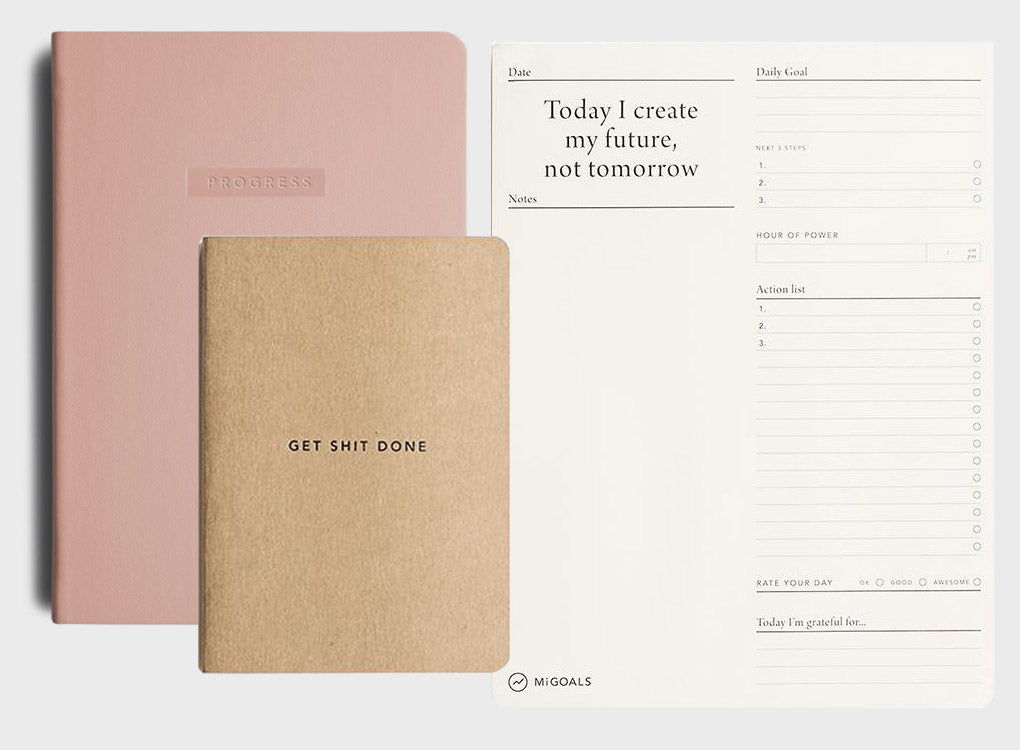 MiGoals Progress Bundle with pink progress journal, kraft and black get shit done notebook and daily productivity pads