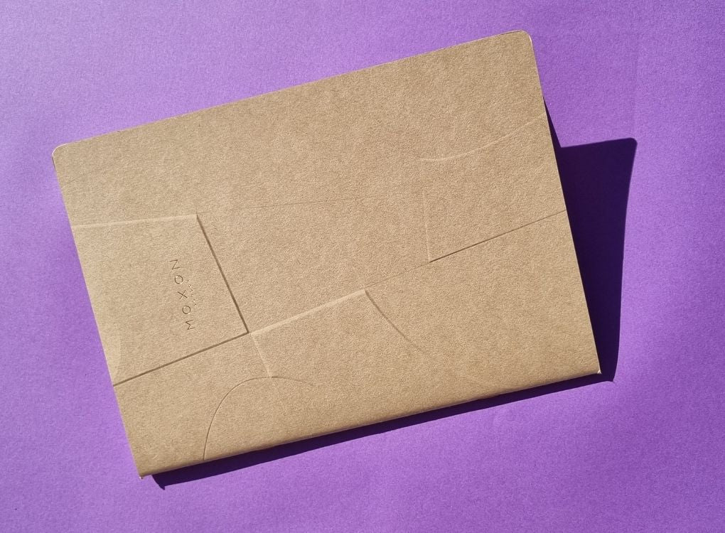 Kraft MOXON B5 ‘Form’ notebook on a purple background with natural sunlight and shadow