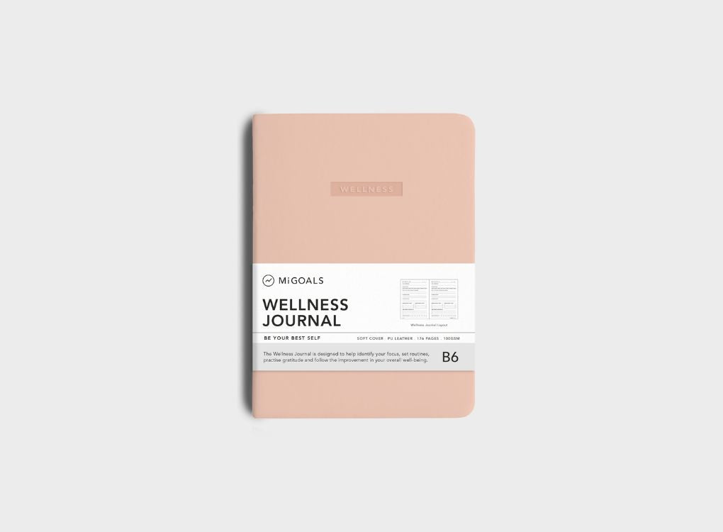 MiGoals Wellness Journal in Just Peachy displayed on a light grey background