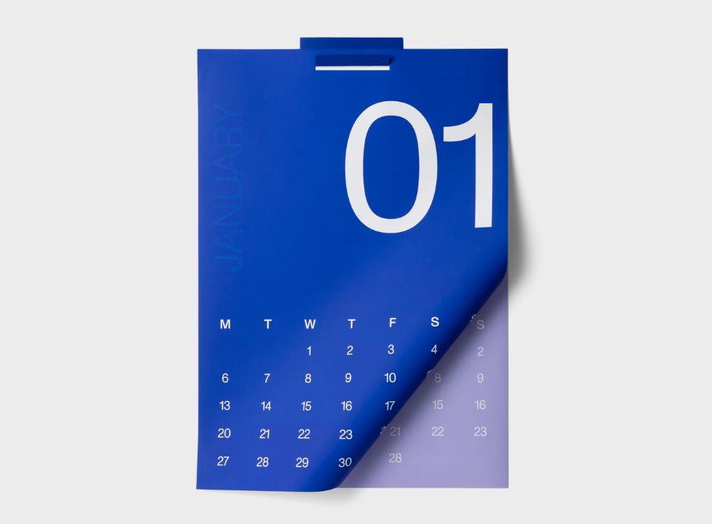 Front view of Karst 2026 A2 Monthly Calendar showing January layout with large “01” typography in white on a blue background.