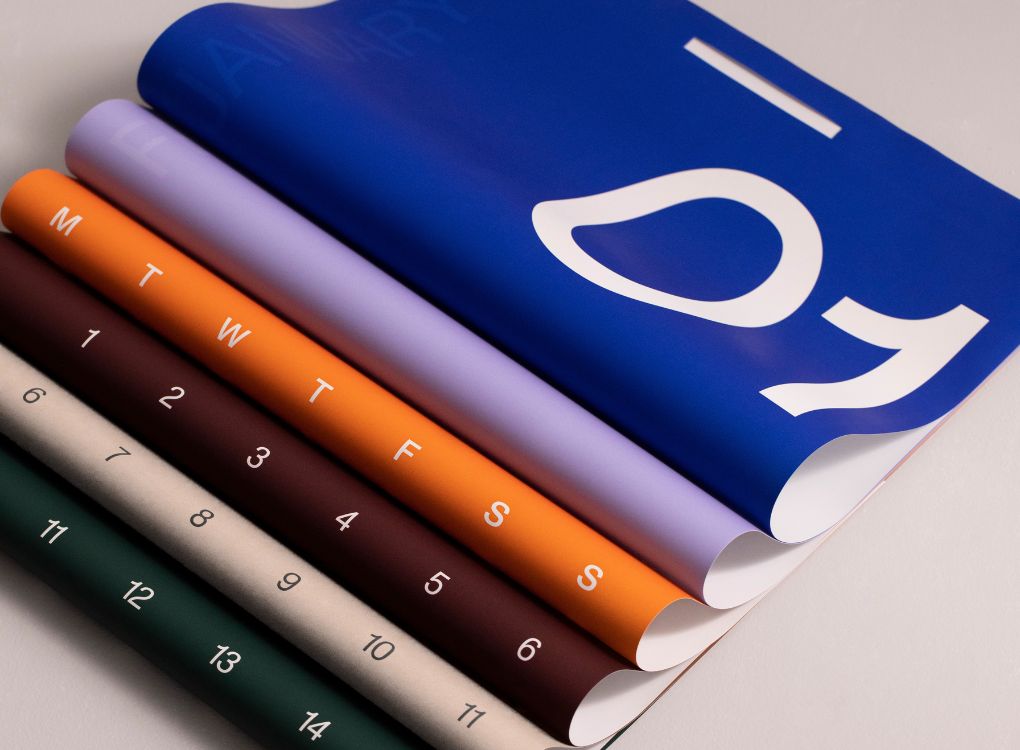 Front view of Karst 2026 A2 Monthly Calendar showing January layout with large “01” typography in white on a blue background.