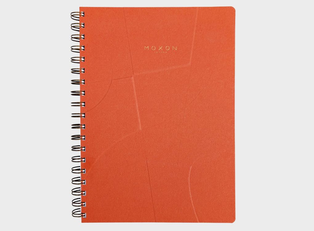 MOXON form B5 notebook in Orange. Wirebound notebook with gold foil details. Made using recycled paper.