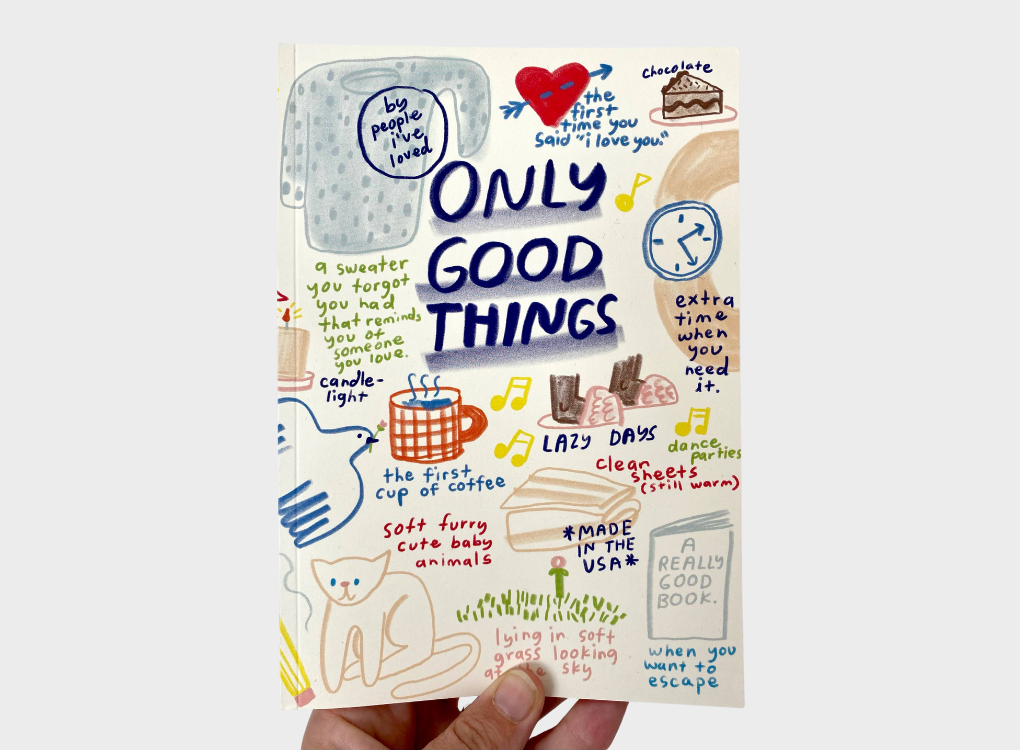 Notebook with lots of illustrations and text on the front cover. The stand out text says: Only Good Things. 