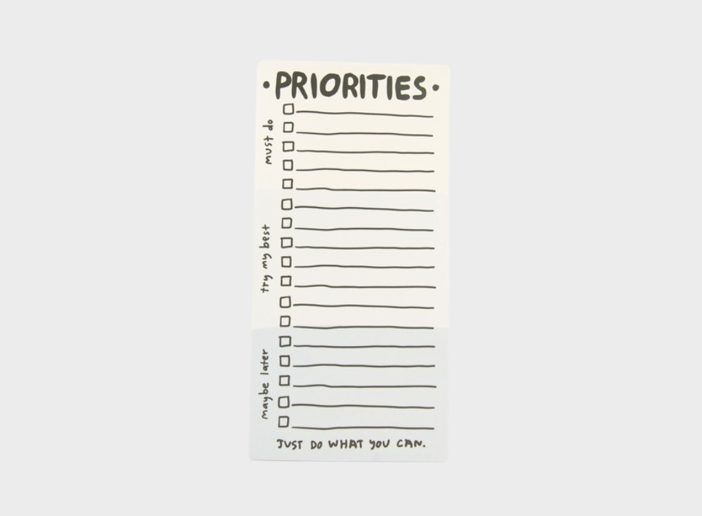 Checklist notepad with 'Priorities' as the title.
