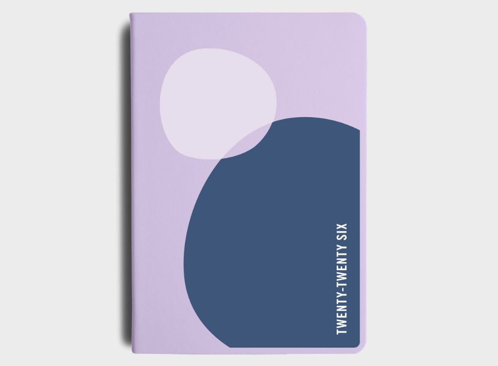 MiGoals 2026 A5 Weekly Spread Diary – From Little Things, Lilac cover with abstract design.