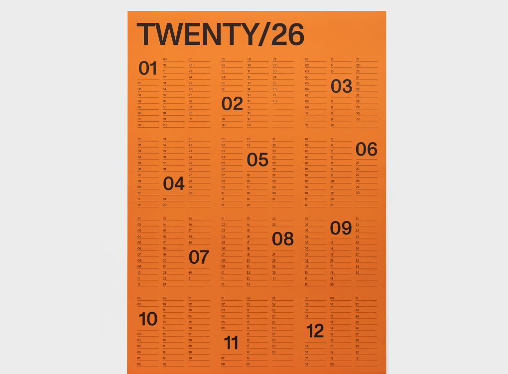 Karst 2026 A1 Yearly Calendar in bold orange with minimalist black typography, showing all 12 months laid out in a grid format with “TWENTY/26” at the top.