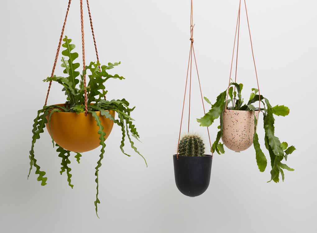 The SALT BLOCK COLOR DOME HANGING PLANTER IS SKILLFULLY HAND MADE FROM RESIN AND FINISHED WITH TAN LEATHER The planter has a hole in the bottom for drainage and a plug for convenience. Designed in Australia. Worldwide shipping. Free UK shipping.