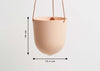 Dimensions for the Block Colour Hanging planter from Capra Designs. 16cm Tall by 15.3cm Wide featuring leather straps to hang.
