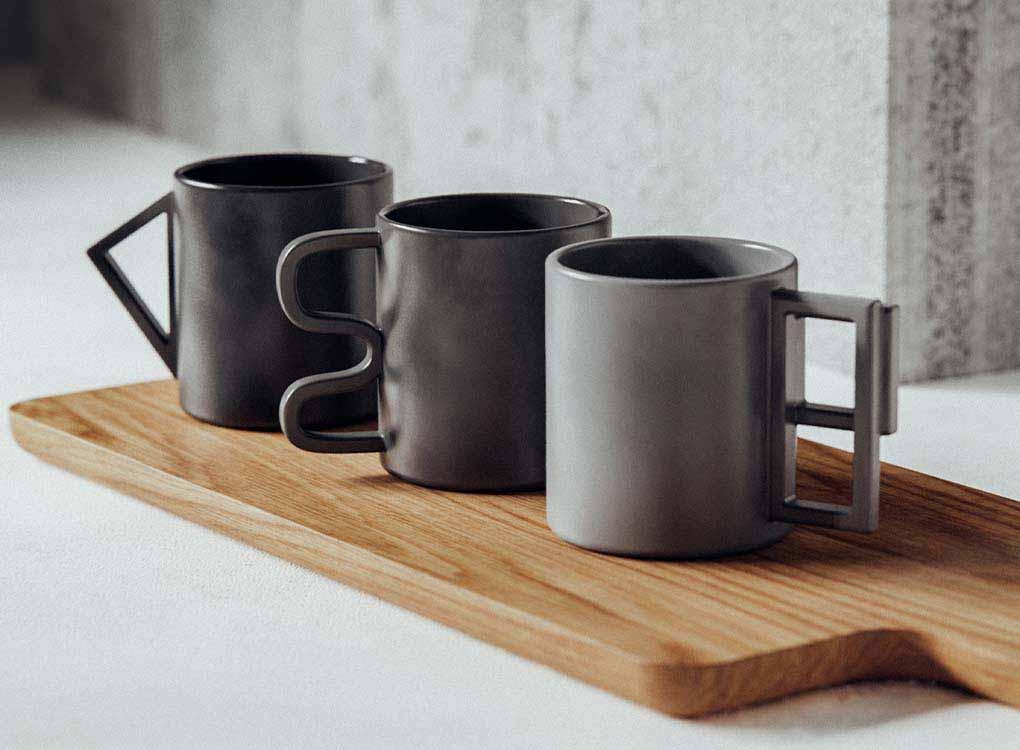 Kitchen set of mugs - 3 Grey sculptural concrete mugs with different shaped handles and a brushed matte finish