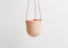 CAPRA DESIGNS HANGING PLANTER - SALT IS SKILLFULLY HAND MADE FROM RESIN AND FINISHED WITH TAN LEATHER. Each planter has a hole in the bottom for drainage and a plug for convenience. Worldwide shipping. Free UK shipping.