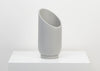 THE SMALL SUMMIT PLANTER HAS BEEN DESIGNED TO PROVIDE AN ORIGINAL BACKDROP FOR YOUR PLANTS. Perfectly suitable for cascading foliage to reveal the resin at the back. The sculptural sliced silhouette creates a unique planter you can angle in any directions, depending on how much light your plant needs. It comes with a tray. 3 colours available. We ship worldwide. Free UK shipping over £30