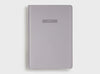 MiGoals goal journal front cover in grey, designed to get you to achieve your dreams.