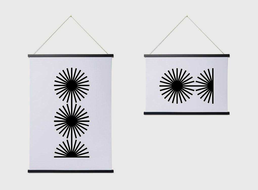 Moxon magnetic frames with a geometric black and white print, hung both portrait and landscape