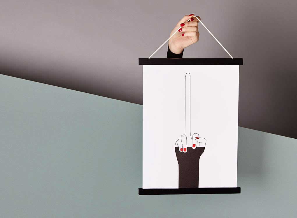 moxon magnetic print frames with a long middle finger print hung up